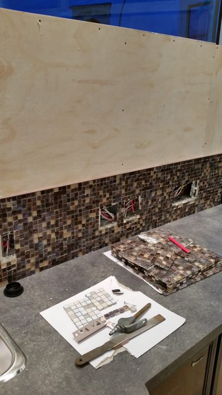 Coffee bar before construction - raw plywood backsplash with mosaic tile install